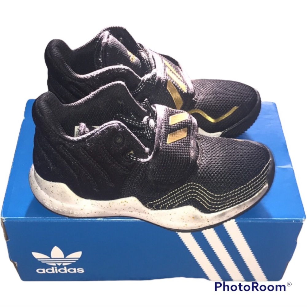 Black and gold Adidas